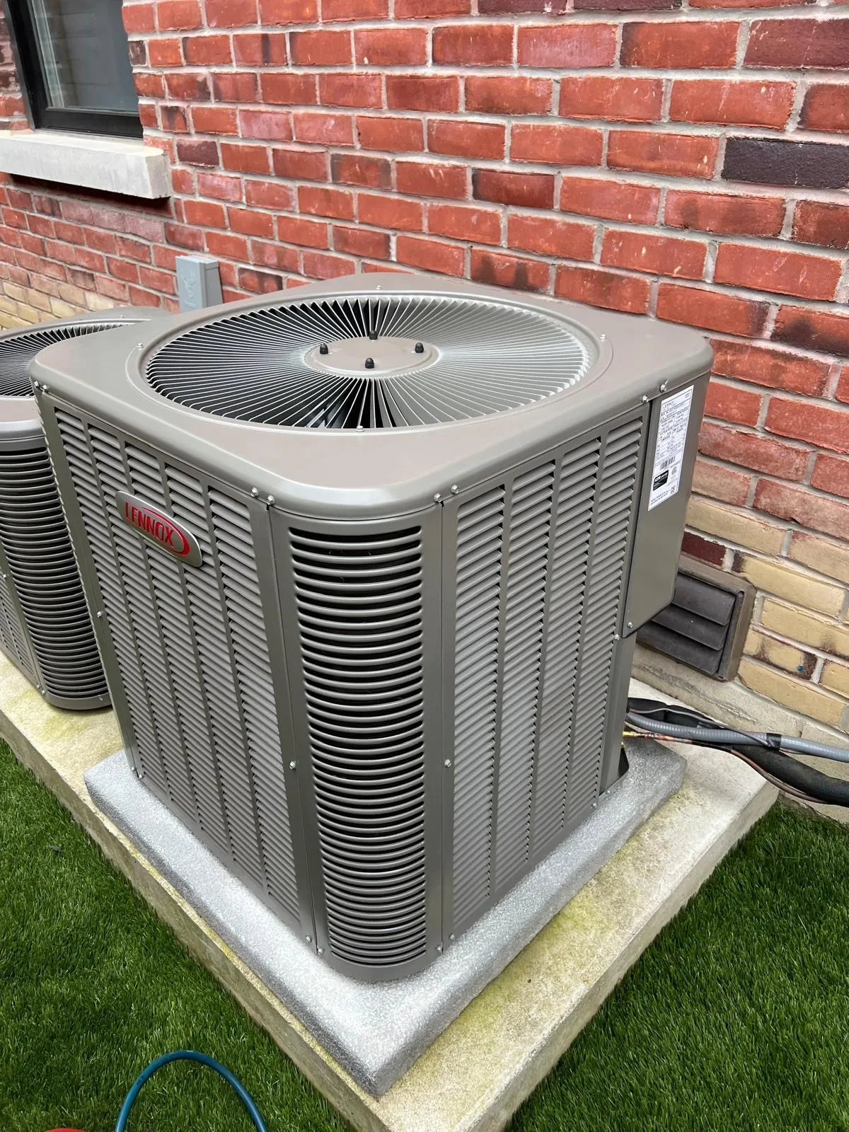 Lennox AC condenser installed by Delson Air at the side of a GTA home